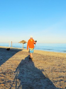 Dennis likes to walk the beach for photos