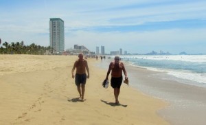 Eric & Dan walking on the beach in Mazatlan